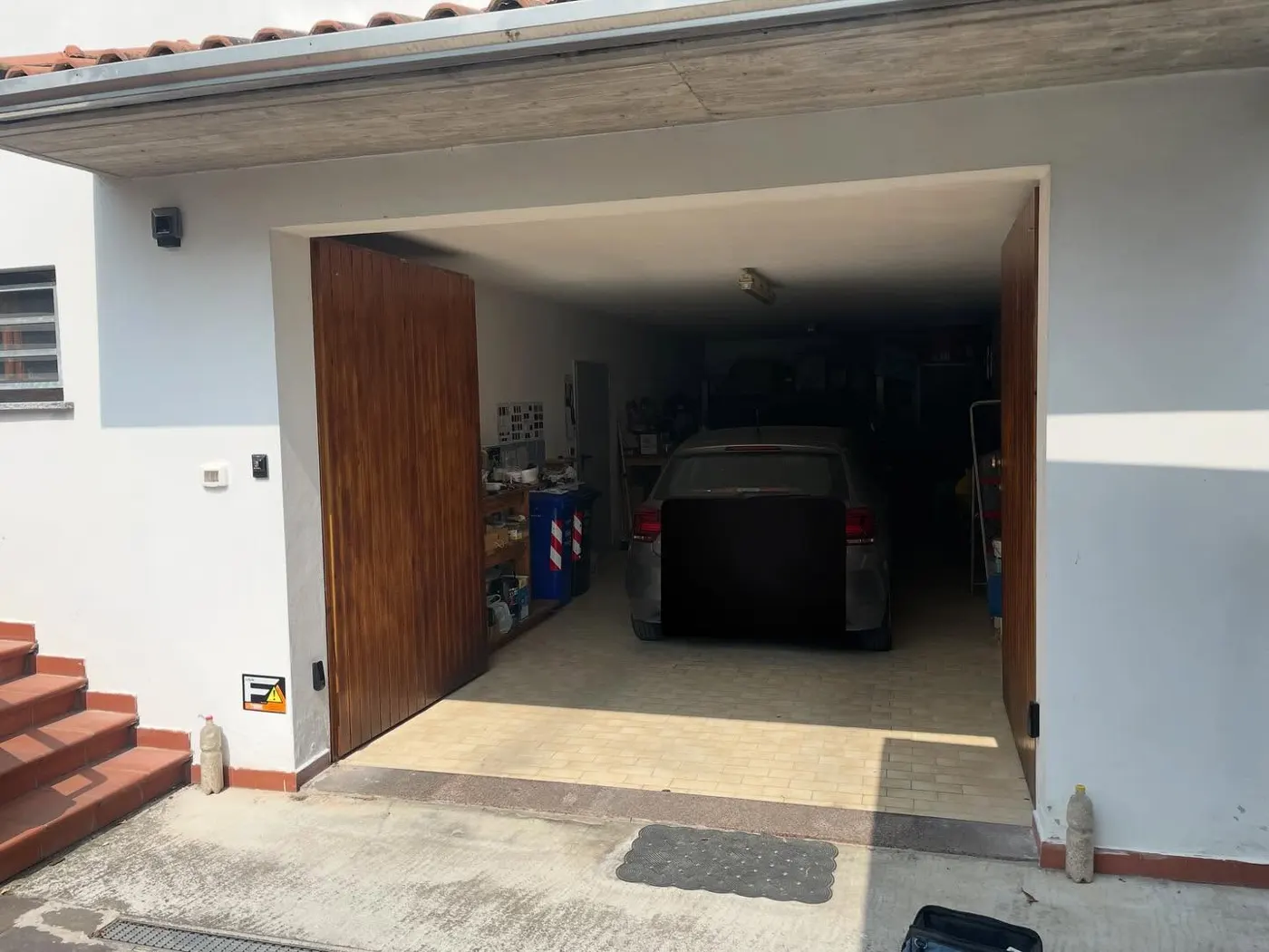 Portone da garage automatizzato in abitazione privata – cancelli automatici Fontanellato